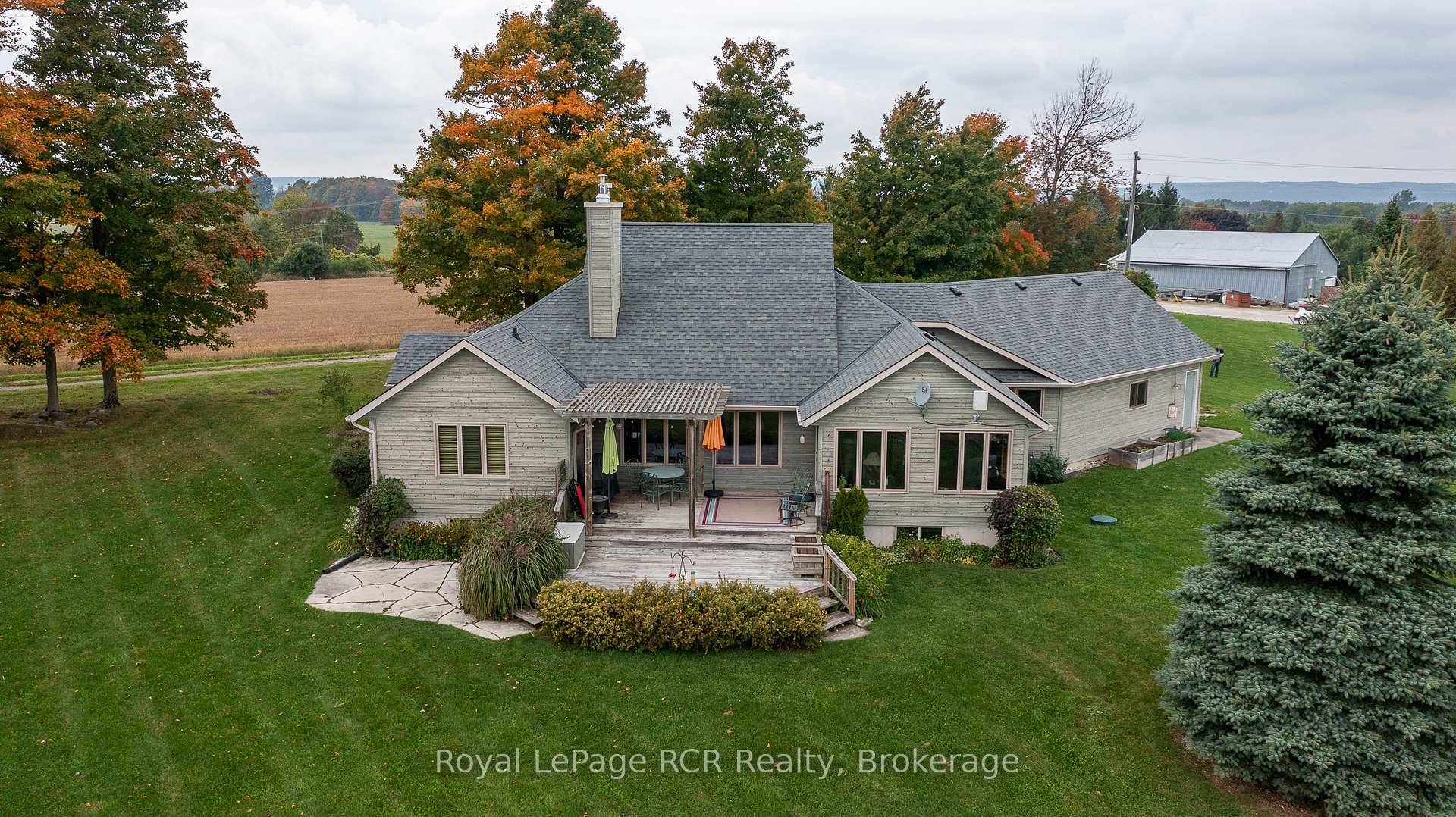 Custom home on 70 acres with commanding countryside views and the Big Head river crossing the south east corner of the property.