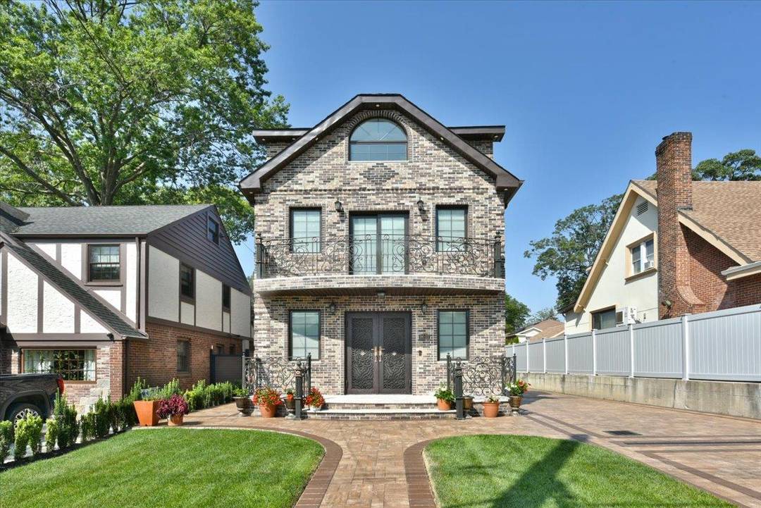 Welcome to 86 22 Somerset Street a refined residence nestled in the prestigious and tree lined neighborhood of Jamaica Estates.