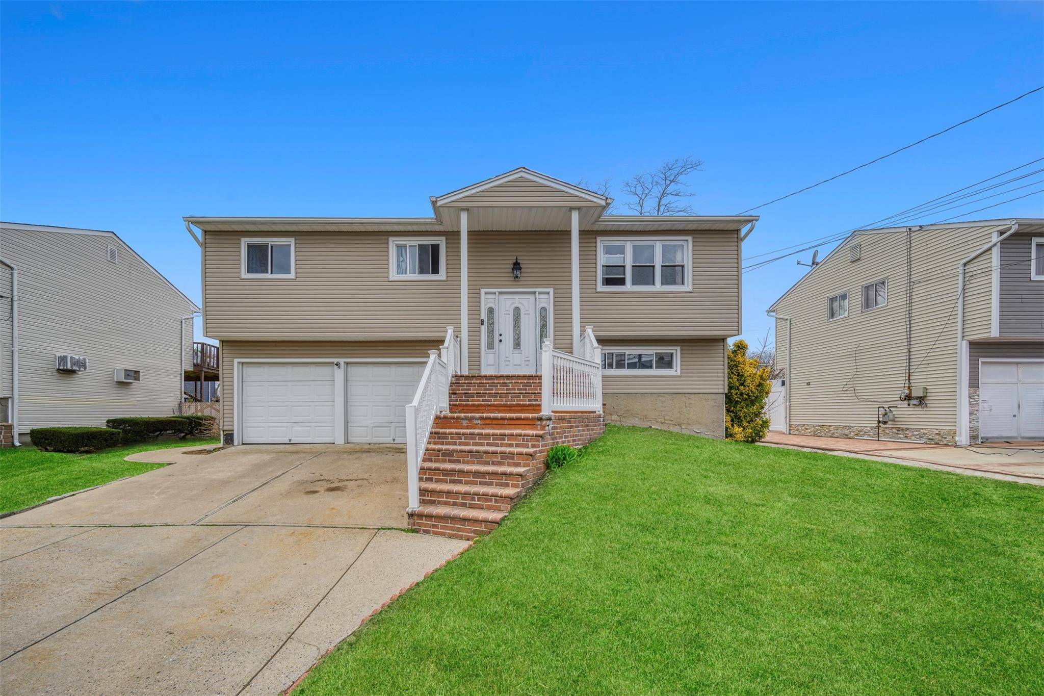 This magnificent and updated wide line Hi Ranch is perfectly situated in the desirable community of Massapequa.
