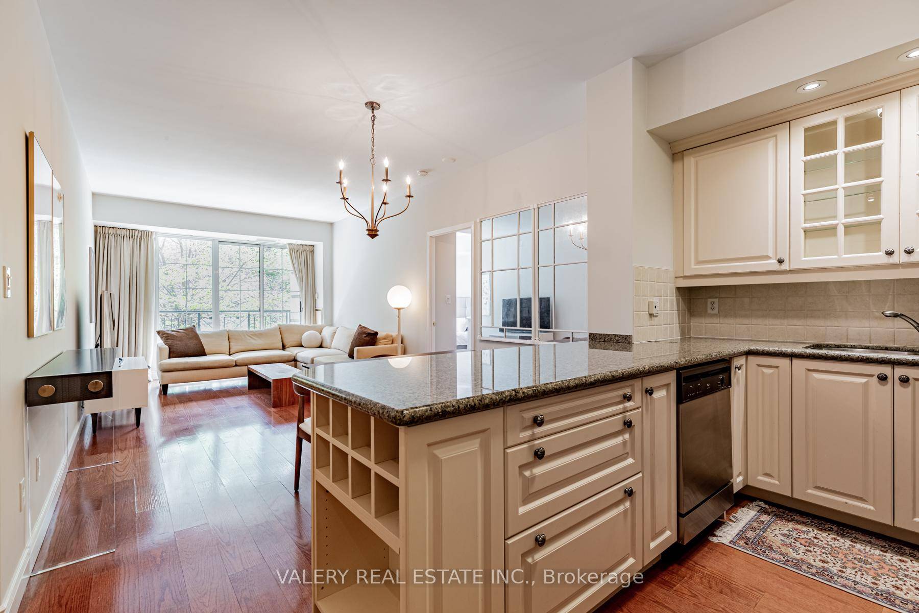 Boutique low rise residence with a charming garden entranceway, just a short walk from Yorkville.