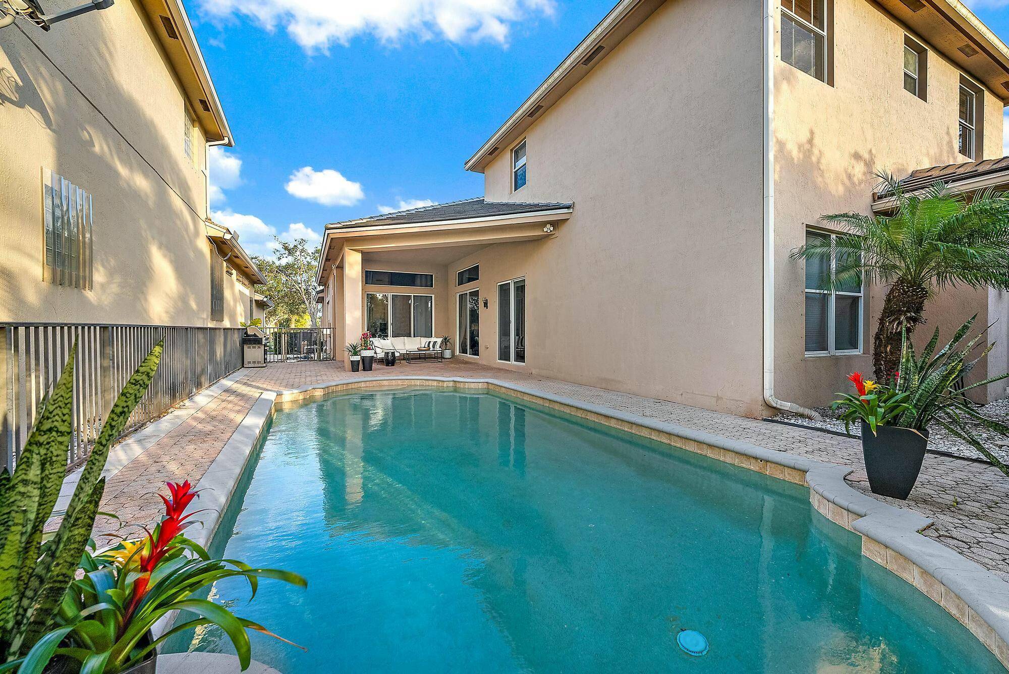 Overlooking the golf course and preserve, this home is nestled in the Osprey Isles gated community.