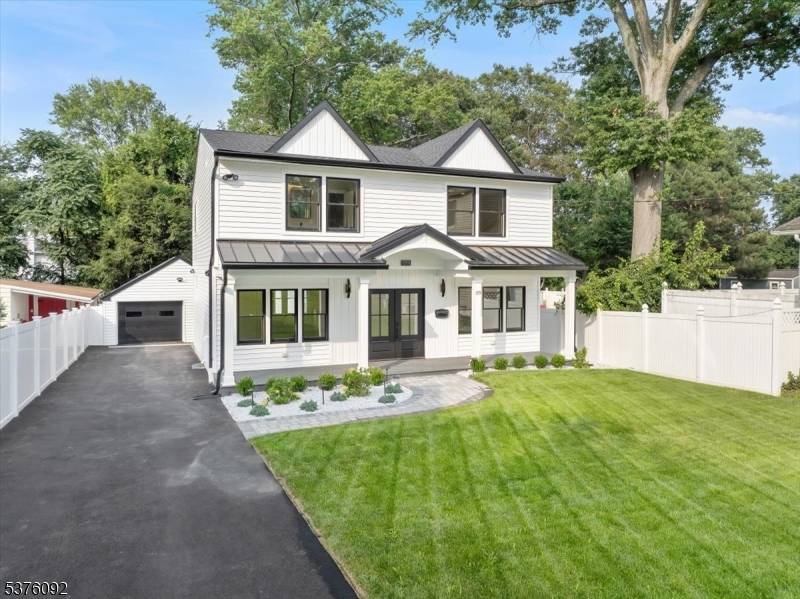 Welcome to a beautifully renovated 4BR, 3 bath Colonial nestled on a desirable side street in Paramus.