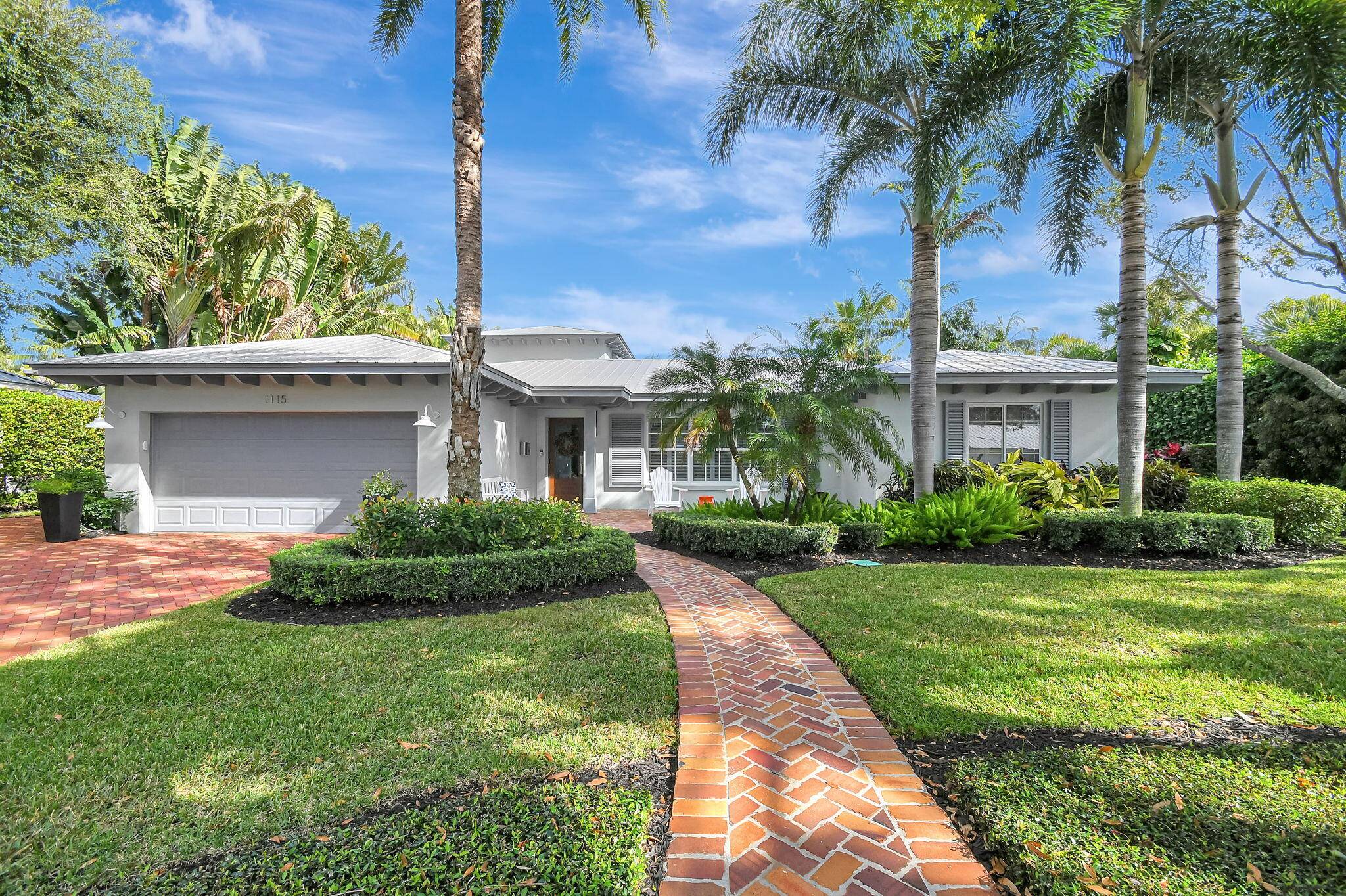 This breathtaking 4 bedroom, 4 bathroom Key West style pool home blends timeless appeal with contemporary comfort, offering the ultimate Florida lifestyle.