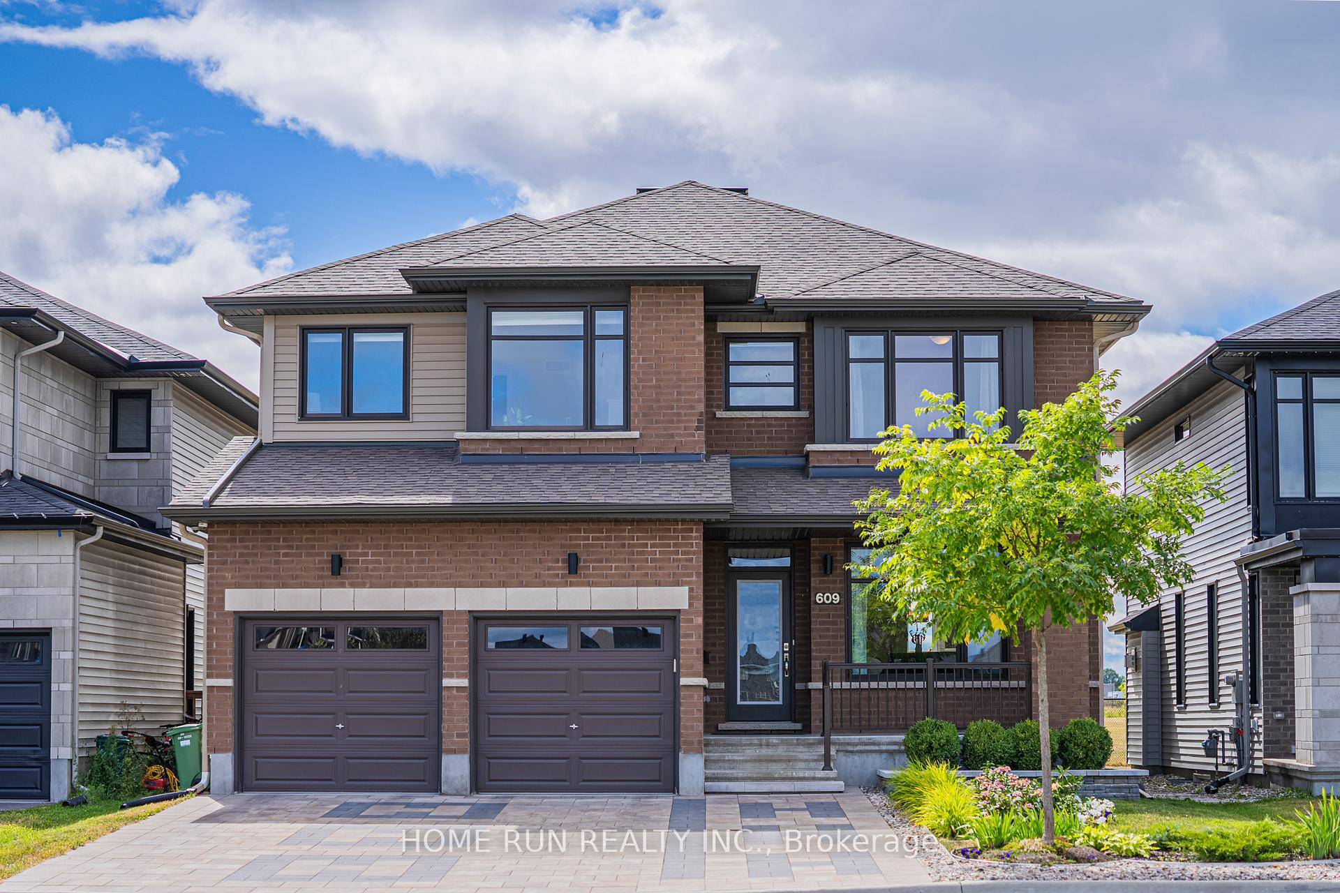 NO Rear Neighbors ! This stunning Millwood model, built by Richcraft Homes in 2020, offers 6 bedrooms and 5 full baths spread across three floors.