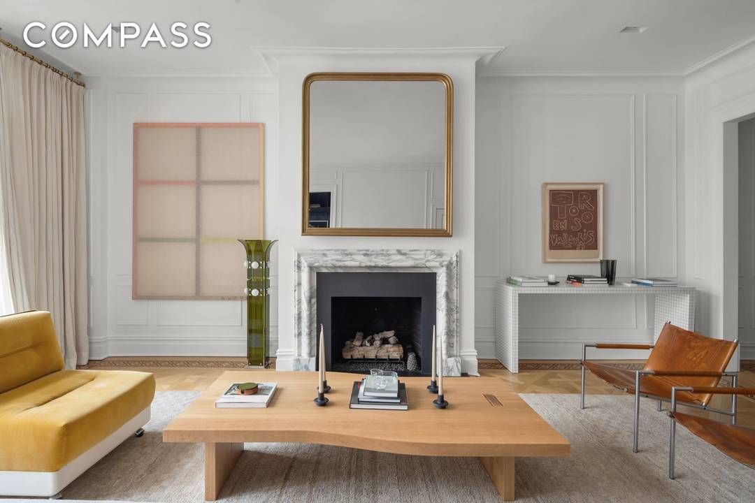 This incomparable full floor residence by AD100 firm Ashe Leandro offers exquisite design, tranquil treetop views, private outdoor space, and a sought after key to Gramercy Park.