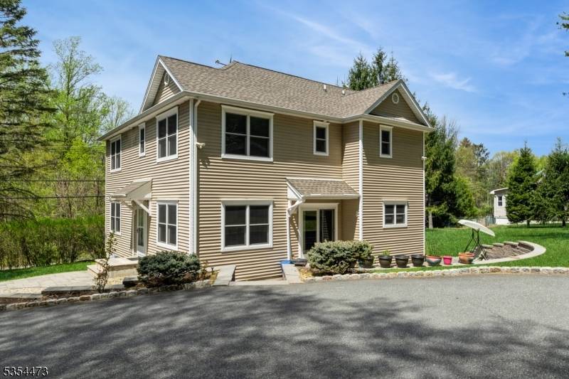 Stunning 3 Bedroom Colonial with Modern Upgrades and Privacy.