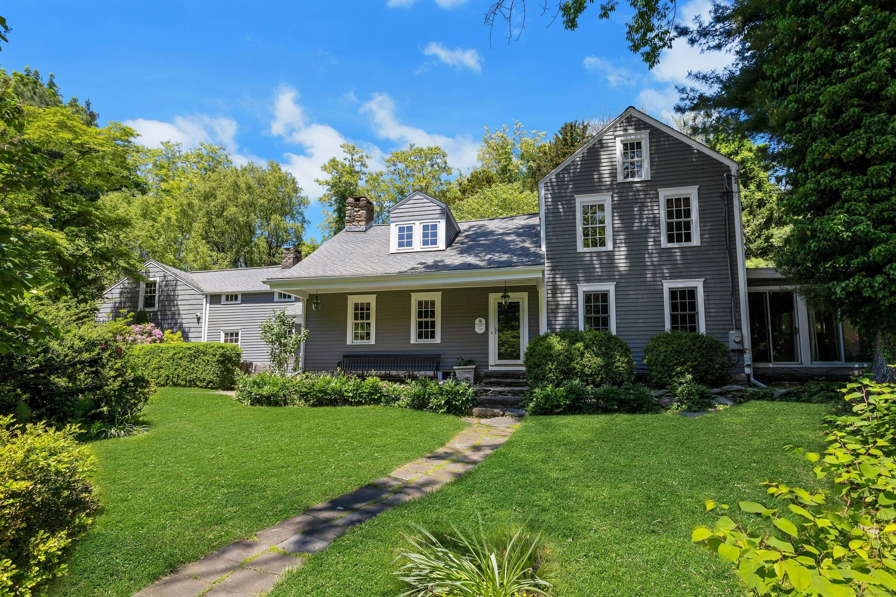 Own a piece of history with the Quintard Frost House, a stunning antique Dutch Colonial home built in 1715 that seamlessly blends historic charm with modern comfort.