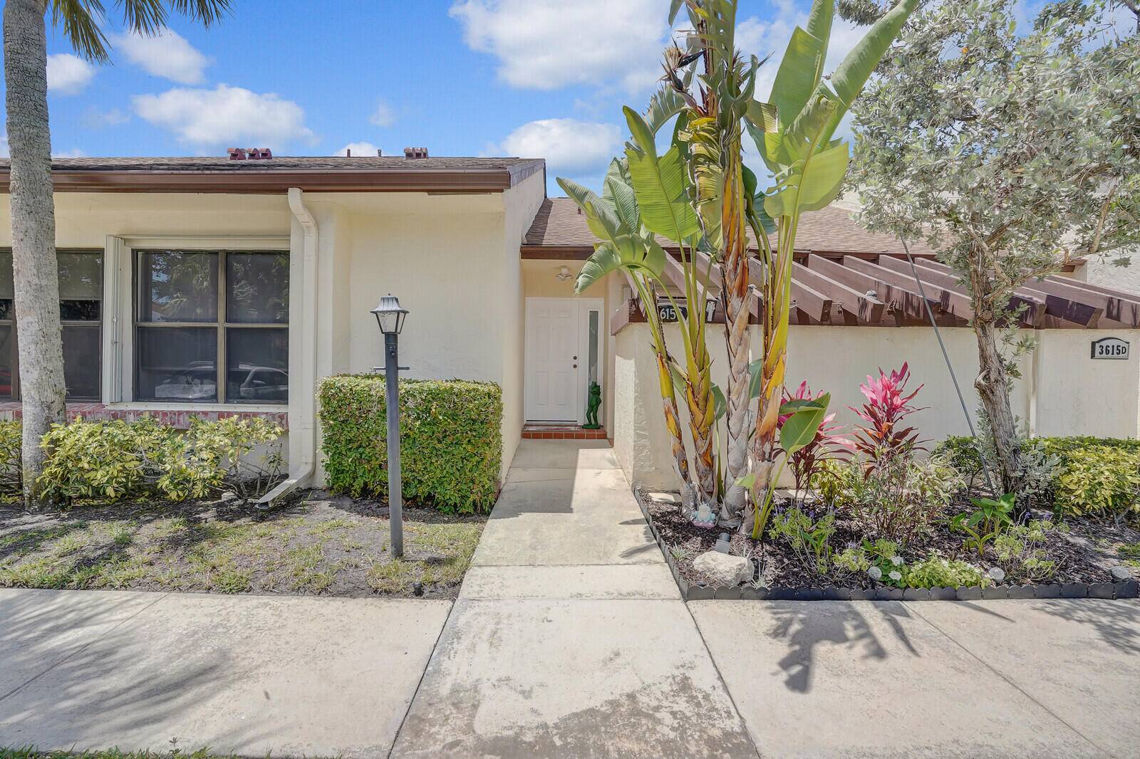 Beautifully renovated and meticulously maintained waterfront villa in the desirable 55 Willow Bend community.