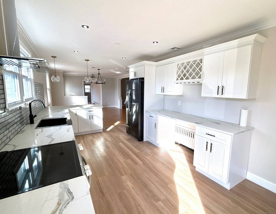 Completely renovated ranch style single family house with legal one bedroom in law apartment with private entrance.