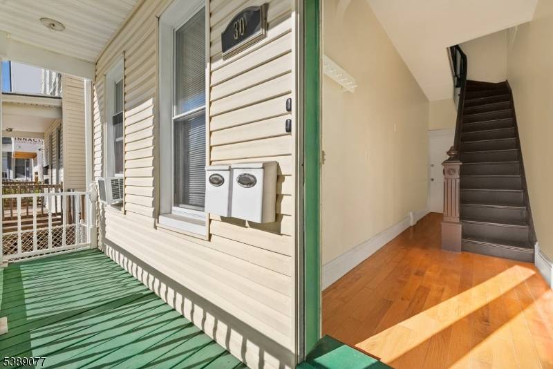Full of warmth, character, and versatility, this sunlit two family home offers the perfect blend of old world charm and modern day convenience whether you're looking to live, invest, or ...