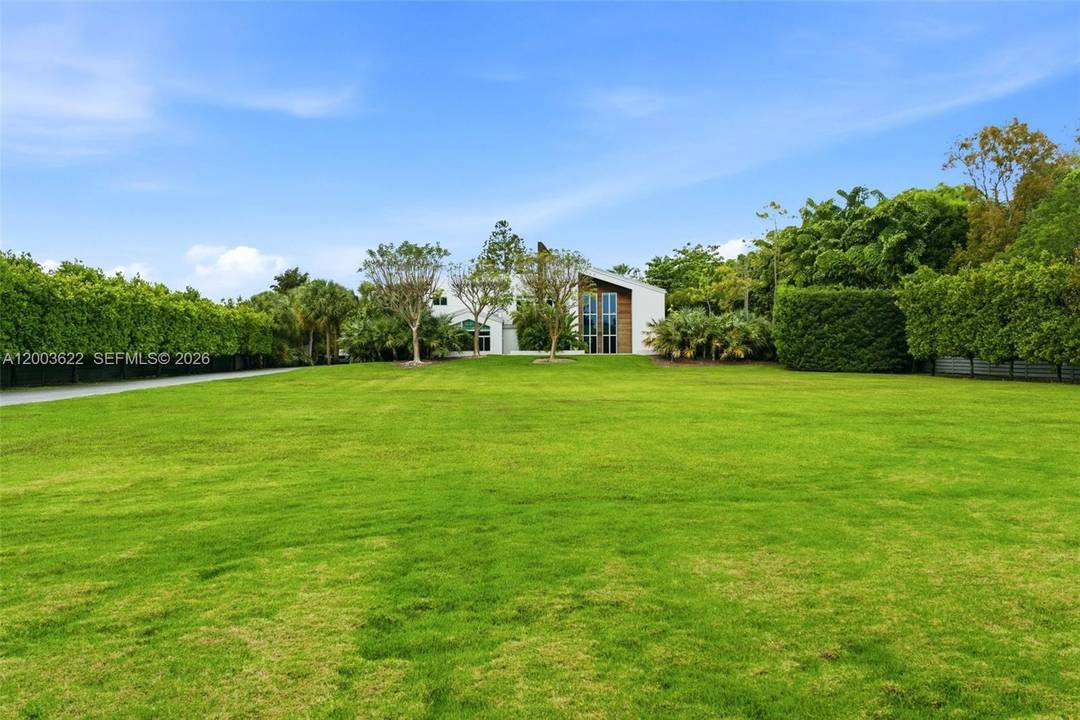 Experience unparalleled modern luxury in this spectacular split plan 6, 355 square foot architectural masterpiece set on a sprawling 2.