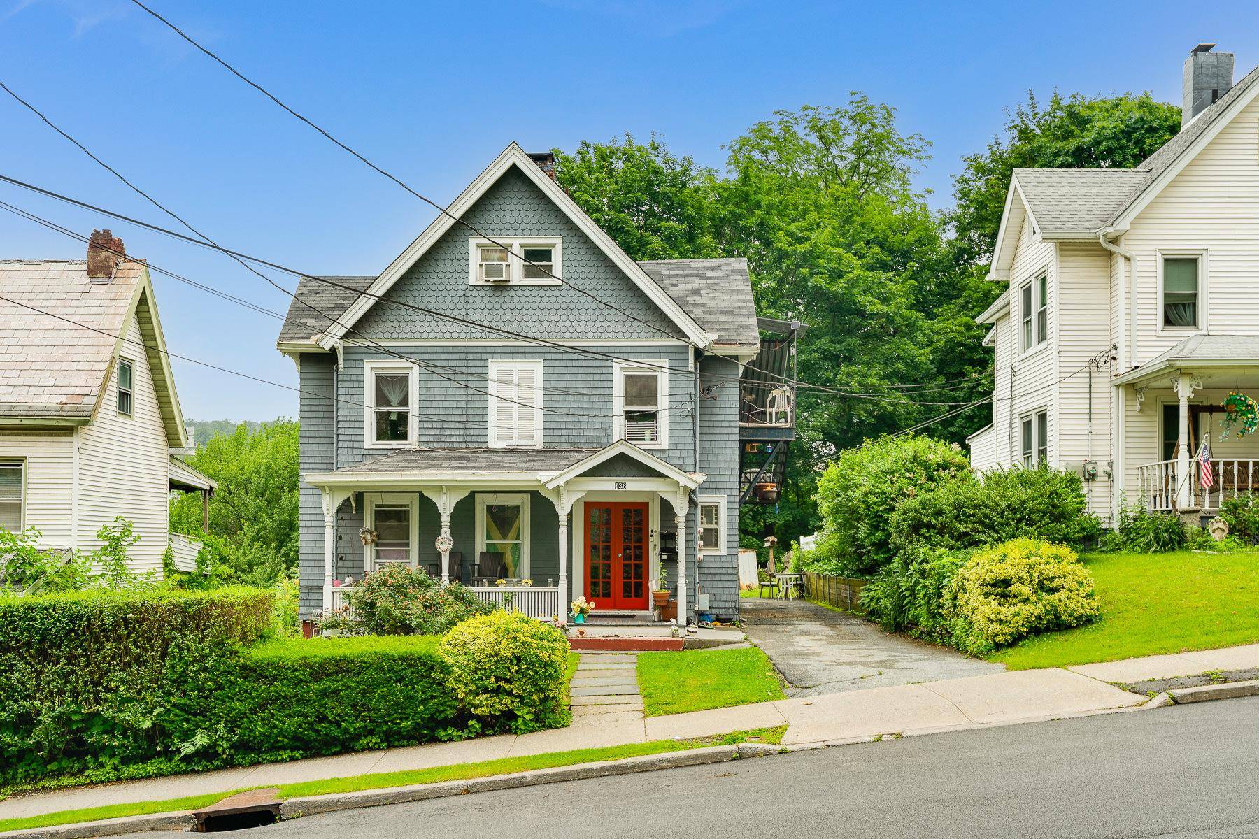 Unbeatable location for this two family home !
