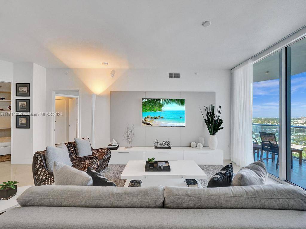 This stunning, fully furnished residence offers a rare opportunity for those seeking luxury living with breathtaking water and skyline views.