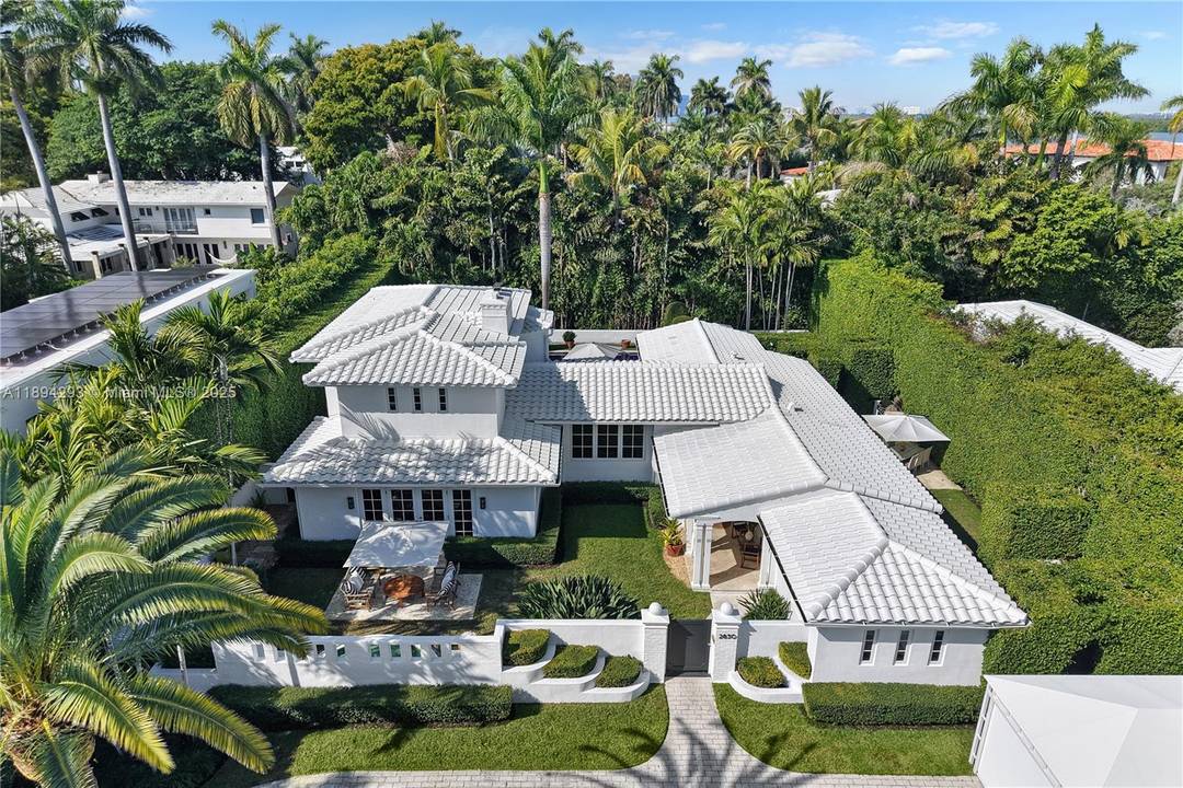 Discover island luxury with this stunning Mid century modern masterpiece by renowned architect Carlos Schoeppl, renovated to perfection for modern living.