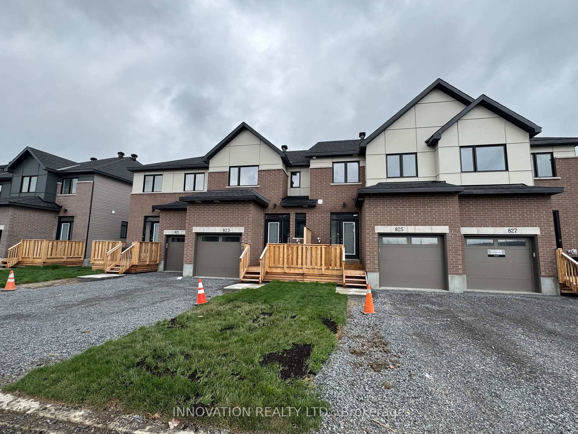 Highly upgraded Brand new Rear Lane Townhouse by Claridge ; the Gannet in beautiful Bridlewood Trails.