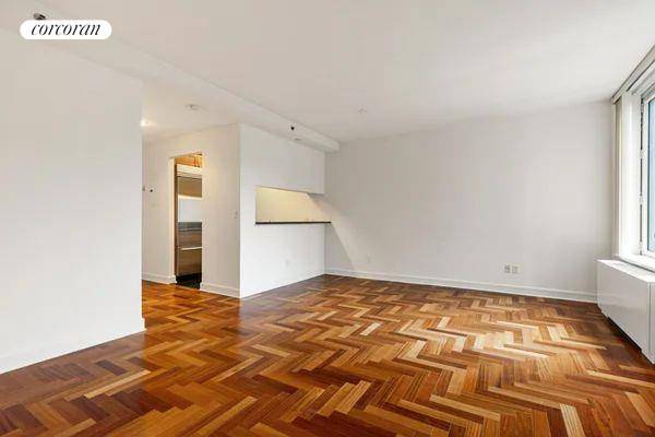 Very spacious Alcove Studio with a large window.