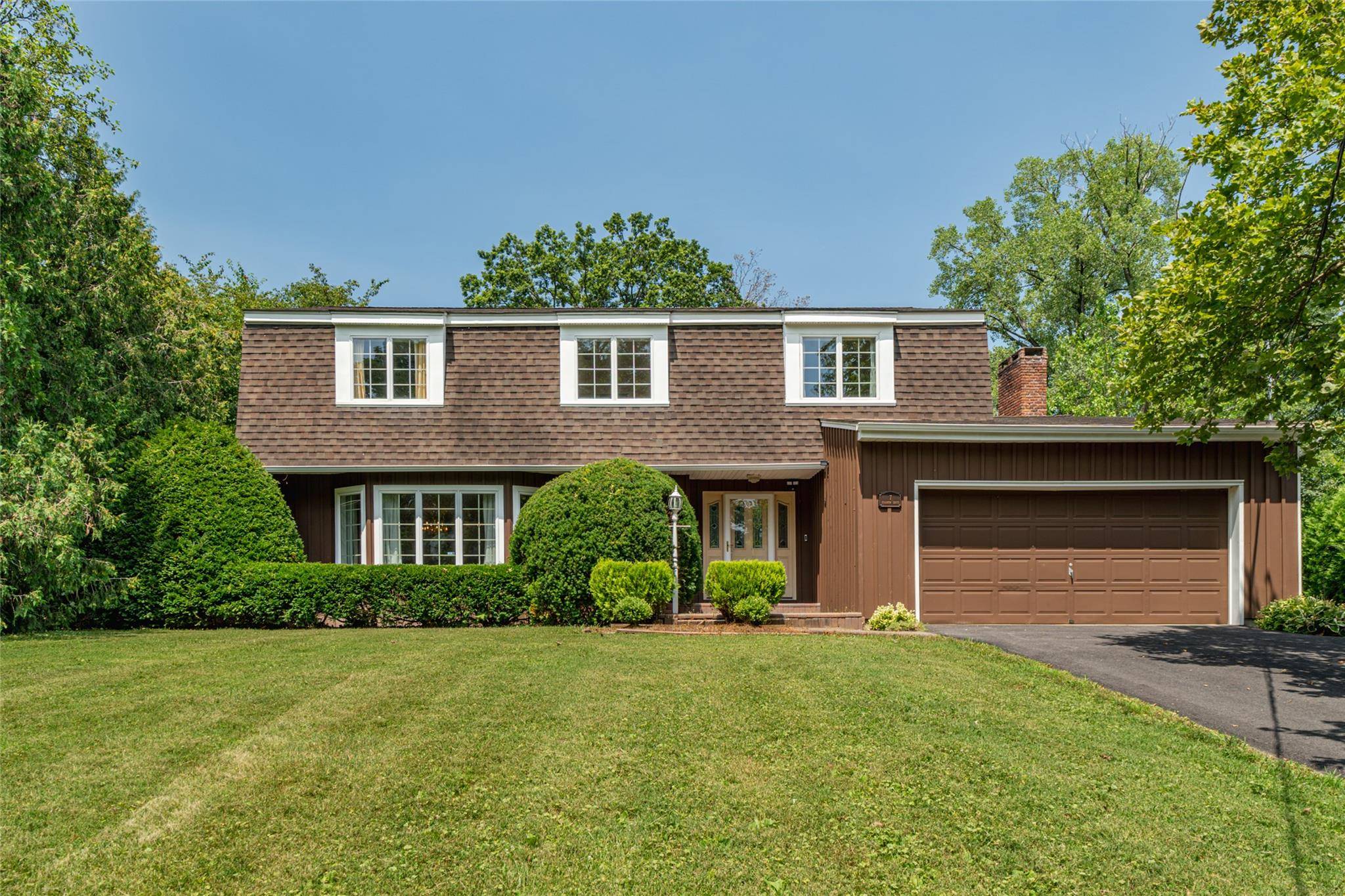 An impressively large house on a lovely tree lined street that everyone notices the one that feels more spacious, a little more grand, and a lot more like home.