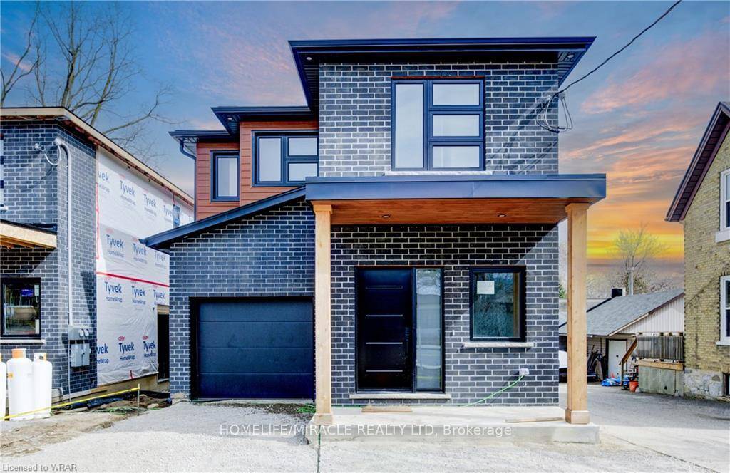 On the lower level, You'll find an open concept two bedroom, one bathroom unit with a separate meter, show casting the same modern aesthetic and boasting its own private entrance ...