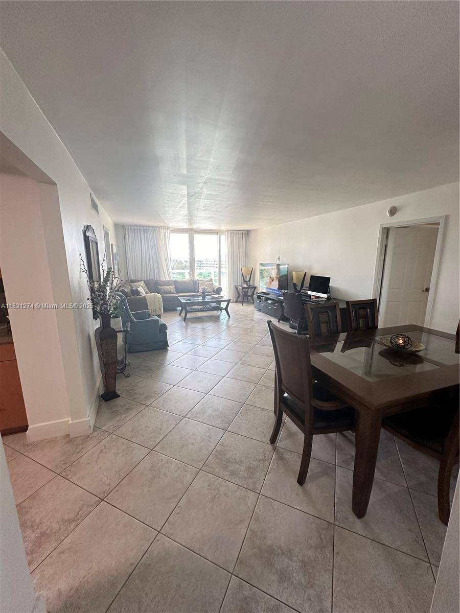 Stunningly renovated condo at Arlen House East, boasting a spacious open balcony and Hurricane Proof Windows, ensuring both comfort and safety.