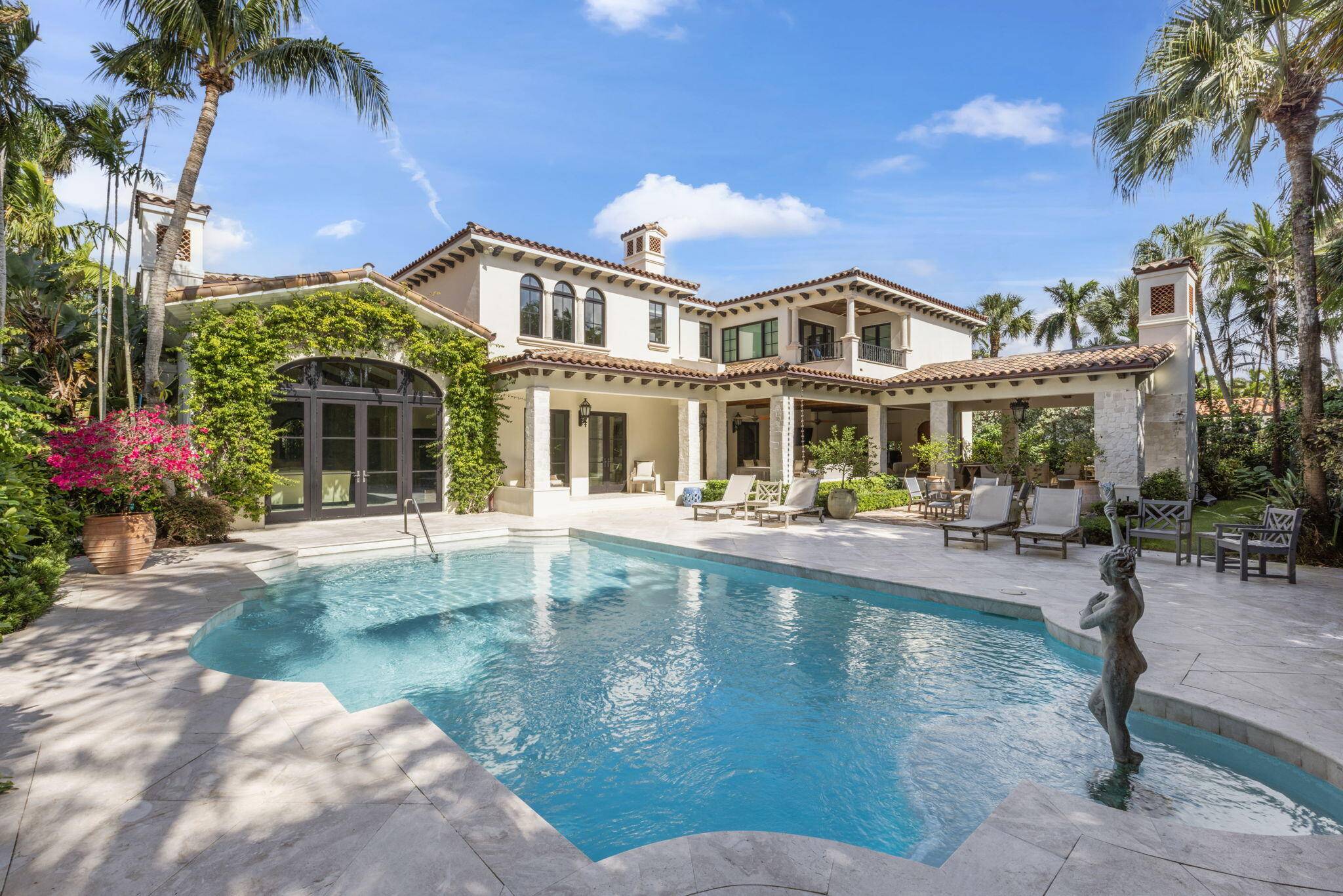 Beautifully reimagined 6 Bedrooms, 6 Full 3 Half Bath estate situated in the Coveted Phipps Estates.