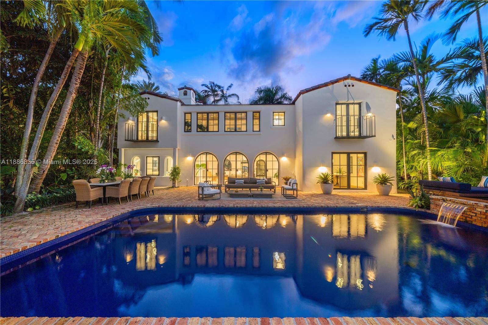 Where contemporary design meets timeless Mediterranean Revival, this stunning waterfront estate defines refined Miami Beach living.