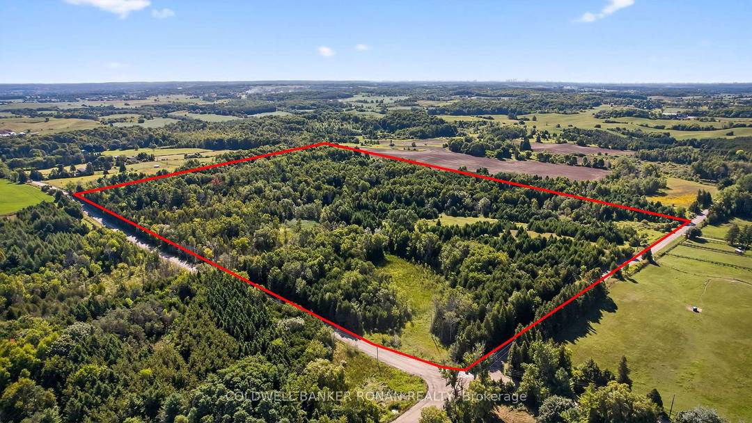 Rare opportunity to own 55 acres of serene, natural landscape in the heart of King Township.