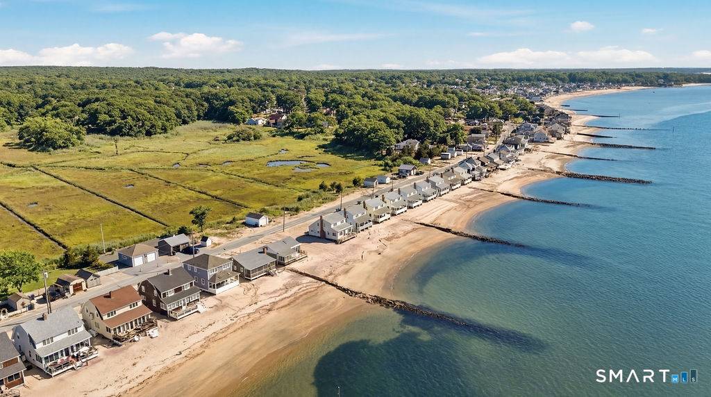 Charming direct waterfront beach cottage in sought after Hawk's Nest Beach, where life slows down and every day feels like a vacation.