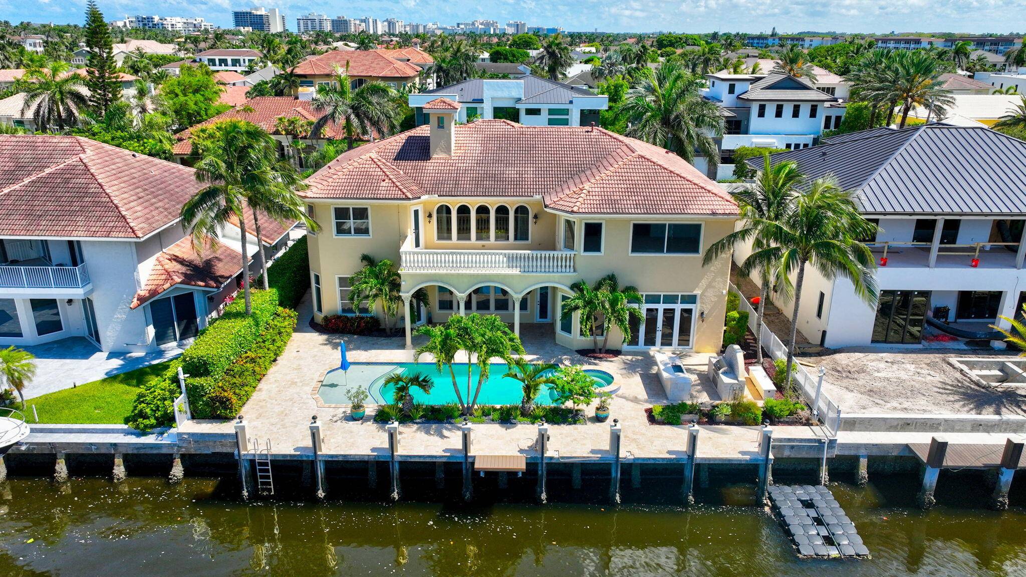 THIS IMMACULATE HOME IS JUST 4 HOMES FROM THE INTRACOASTAL !