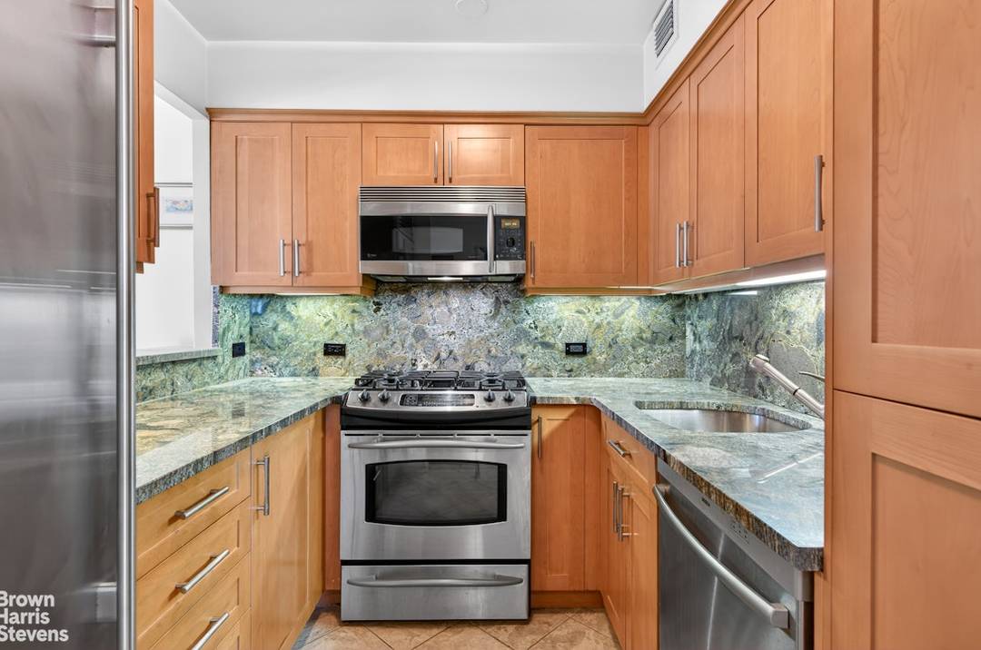1 BR, 1. 5 Bath Condo with Wrap Terrace Be the first to see this fabulous 1 bedroom, 1.