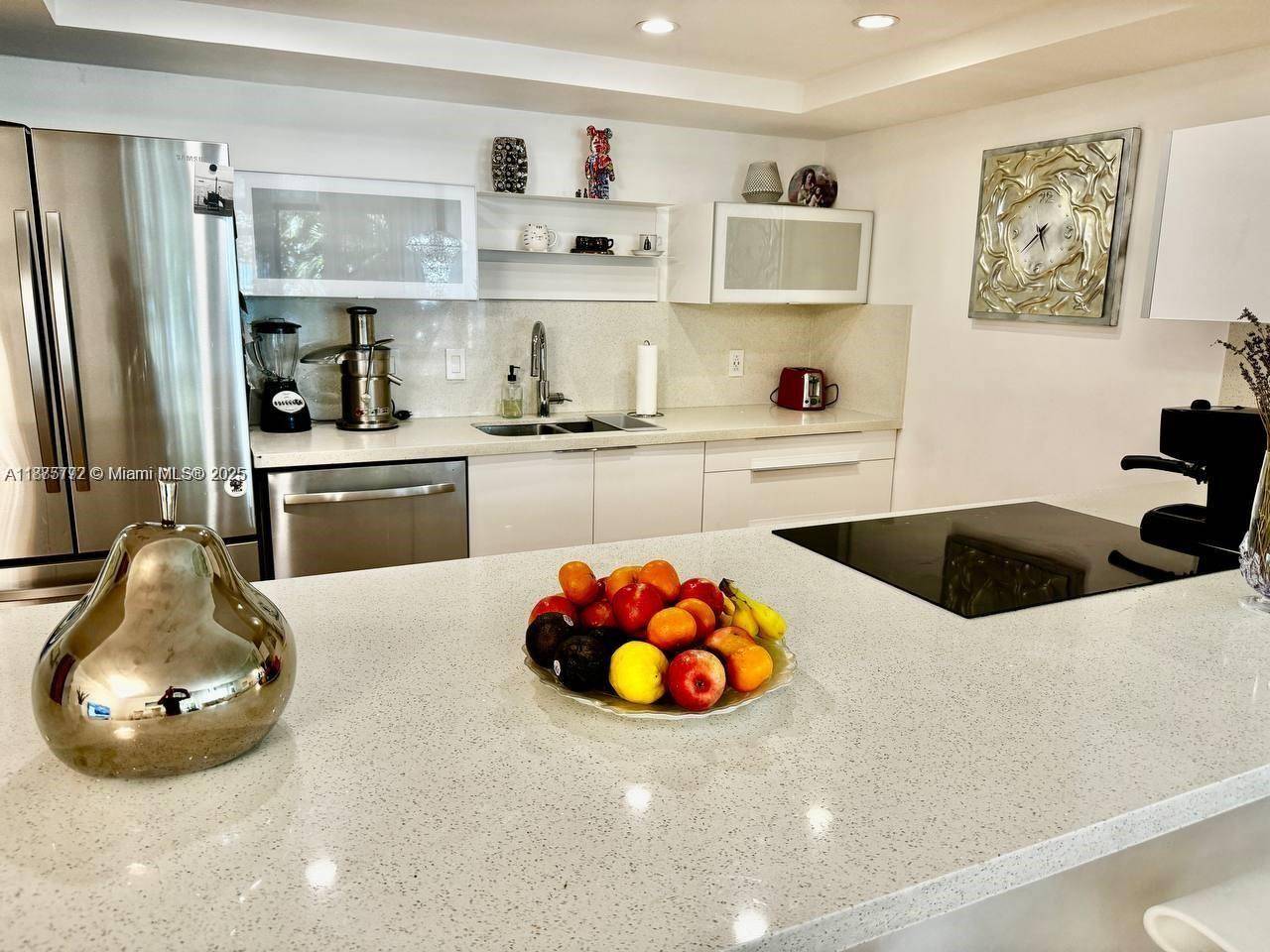 Live in the heart of Three Islands, just minutes away from beautiful beaches, Aventura, and everything you love about South Florida living !