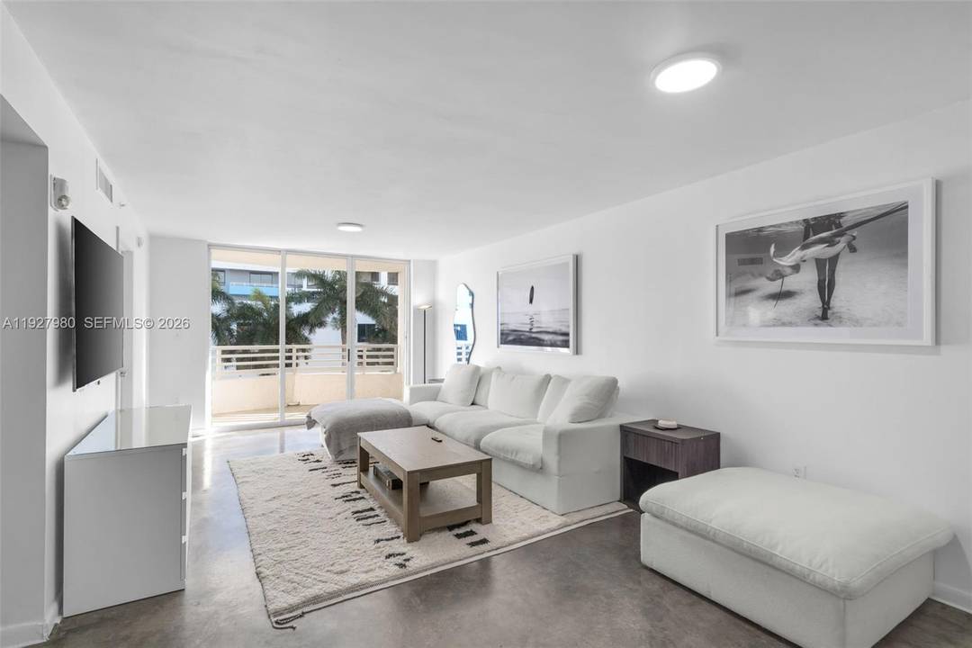 Welcome to this light filled 2BD 2BA residence in the heart of Miami Beach, offering tranquil bay views and effortless indoor outdoor living.