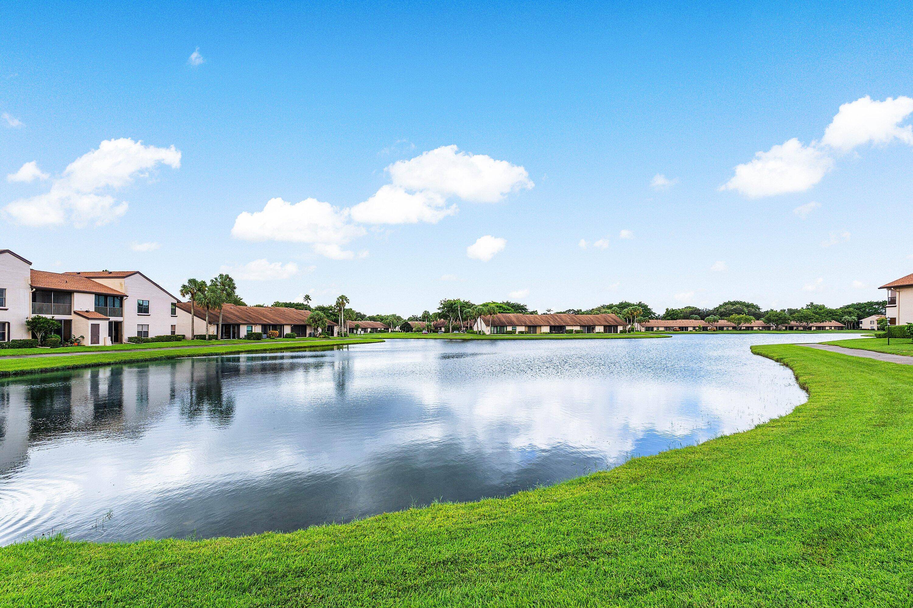 Experience move in ready living in this luxurious ground floor condo within a gated Boca Raton Community.