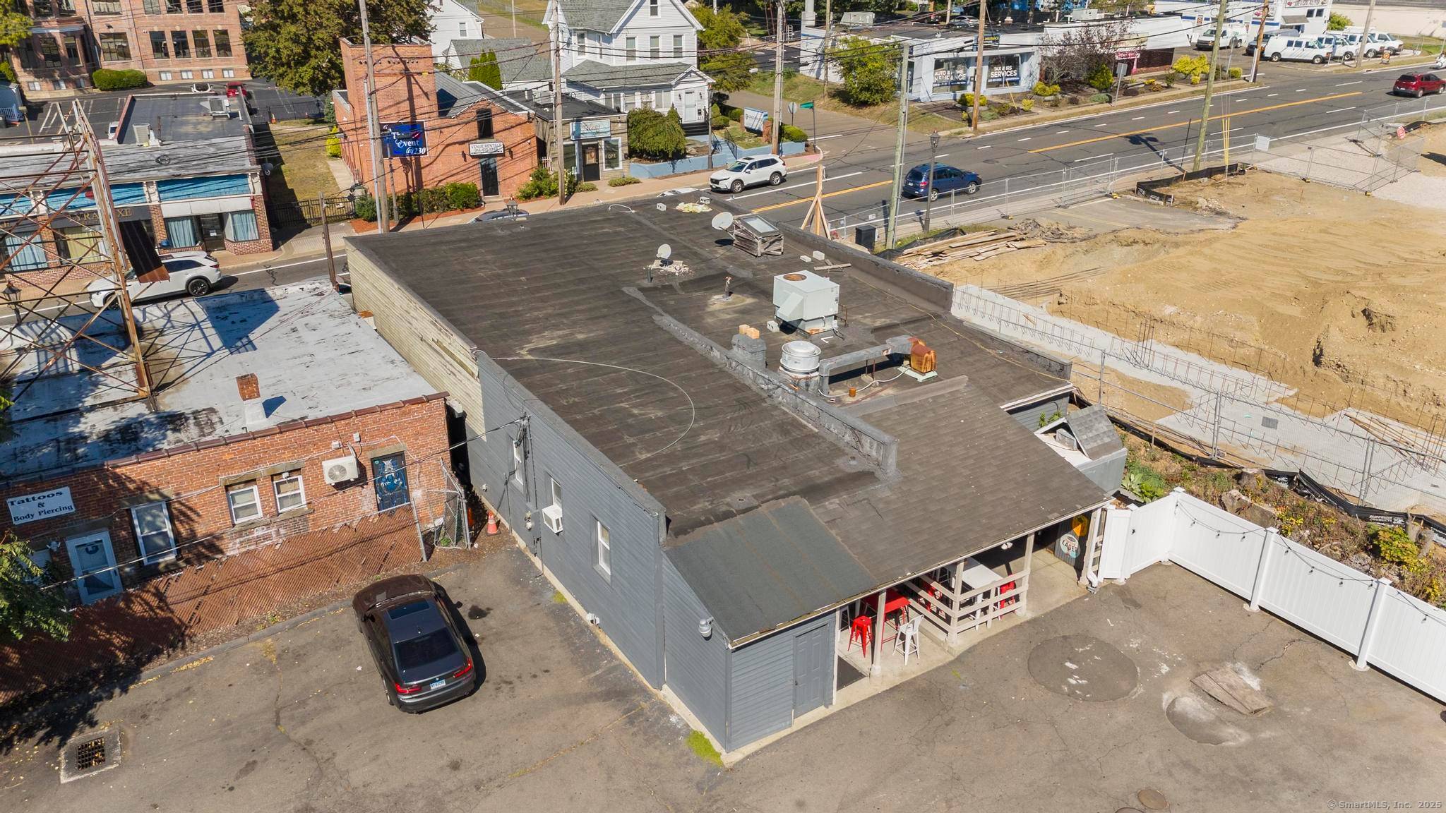 227 Bridgeport Avenue in Milford, CT presents a rare opportunity to acquire a fully operational restaurant with additional income and redevelopment potential.