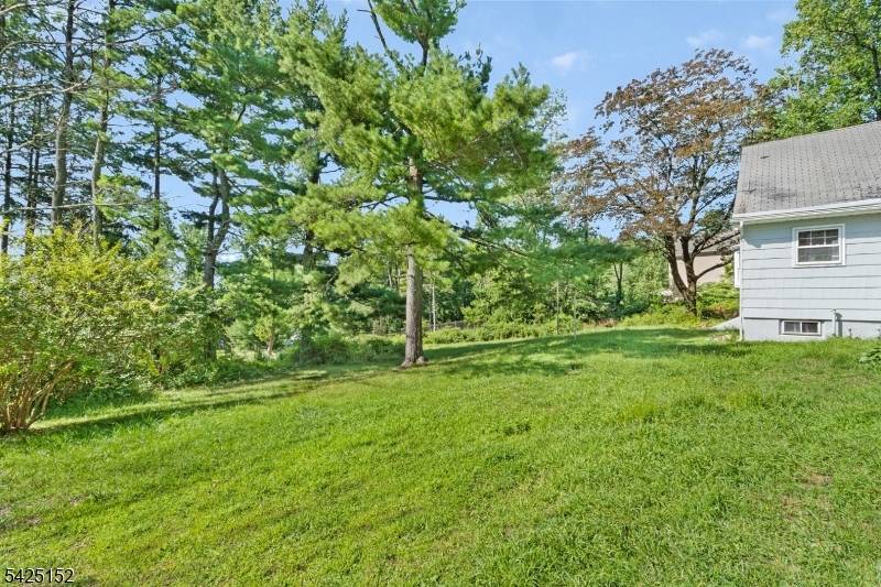 Exceptional opportunity on a private, nearly 2 acre lot tucked away on a quiet, secluded dead end street.