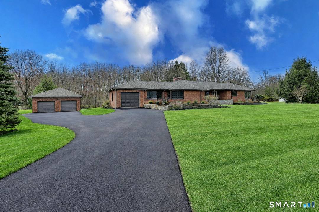 Welcome to 53 Geer Street in Cromwell an exquisite brick ranch that has been completely updated with refined finishes and thoughtful design throughout.