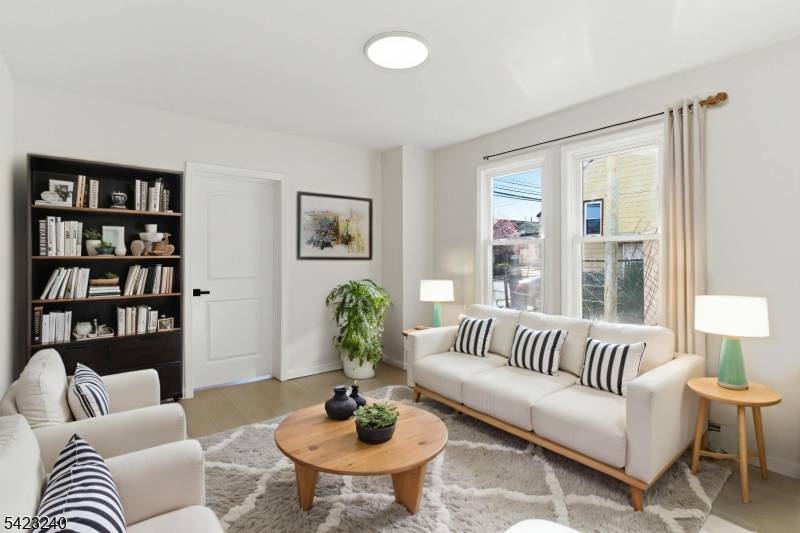 Fully renovated two family property with modern finishes and strong income potential.