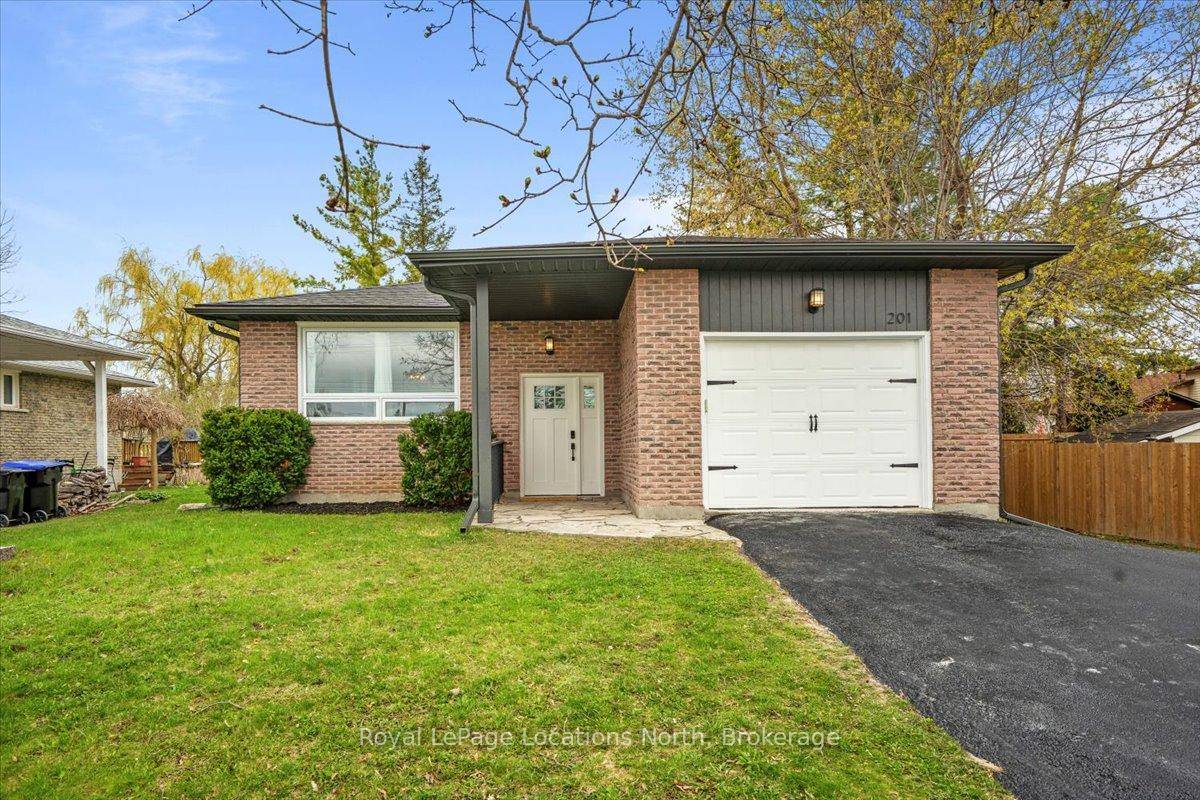 Raised bungalow within walking distance to shops, restaurants, and amenities in the heart of downtown Stayner.