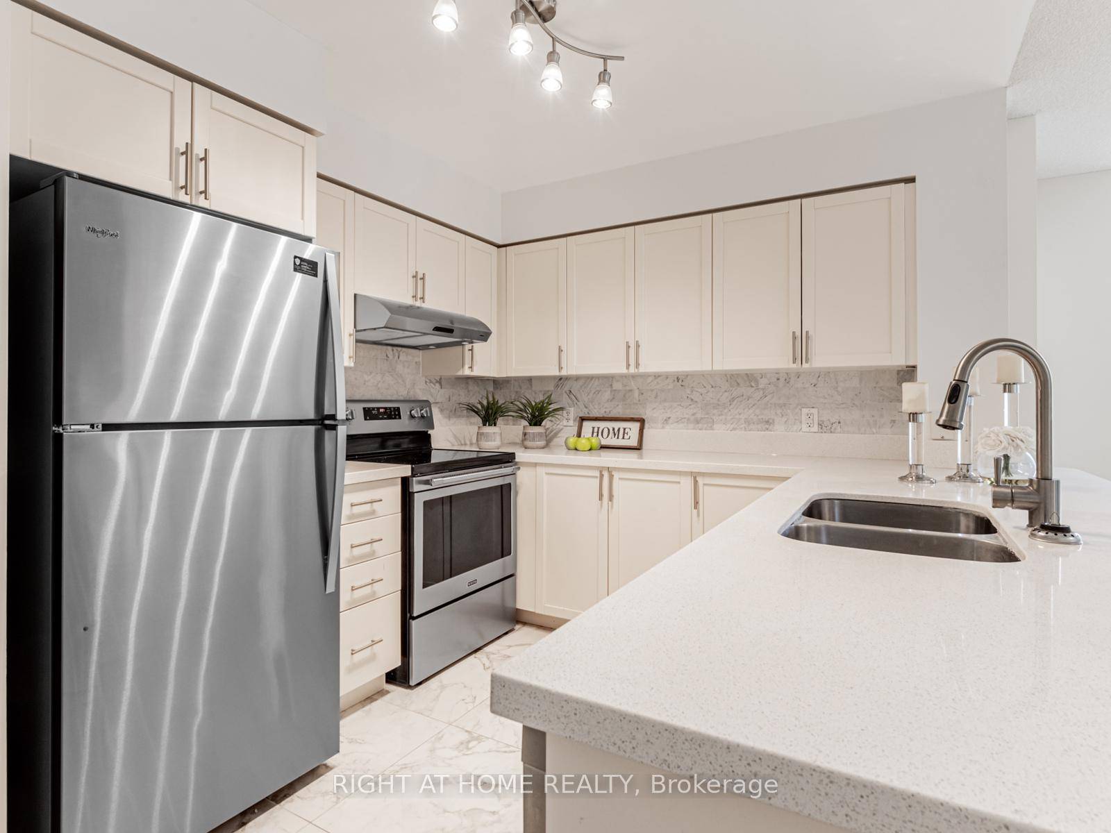 Stunning Open Concept SW Corner Unit !