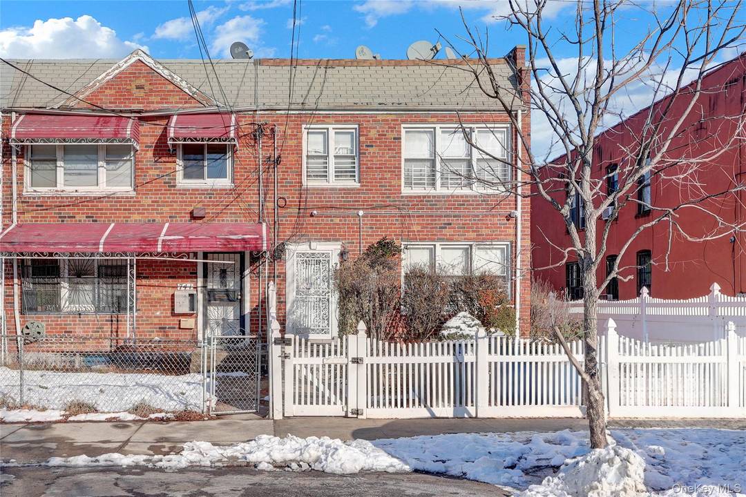 This two story home features five bedrooms, two full baths, two eat in kitchens, and a two car garage.