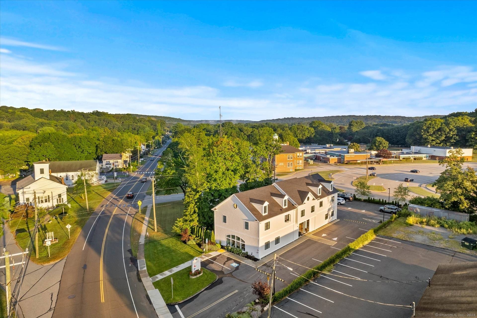 Introducing an exceptional mixed use commercial property located in the dynamic heart of East Lyme, where modern design seamlessly merges with timeless elegance.