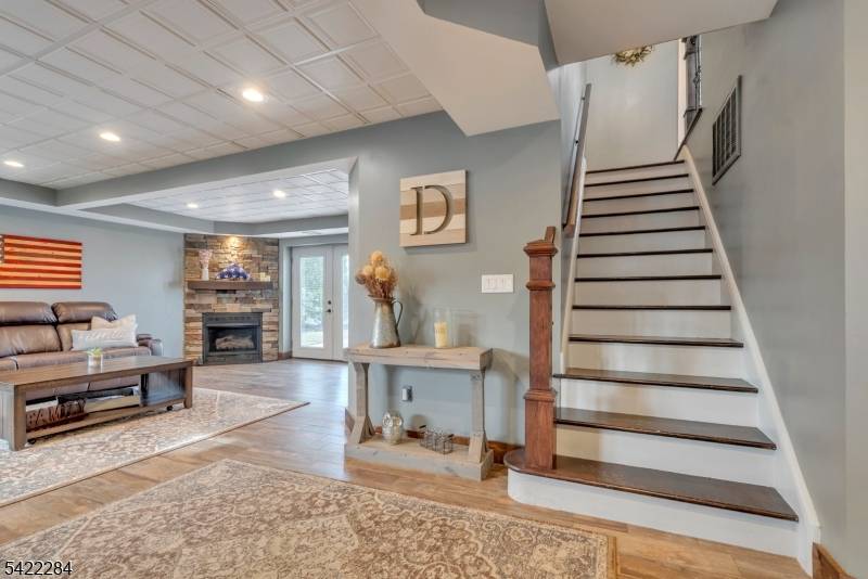 Step into this beautifully renovated raised ranch and feel instantly at home.