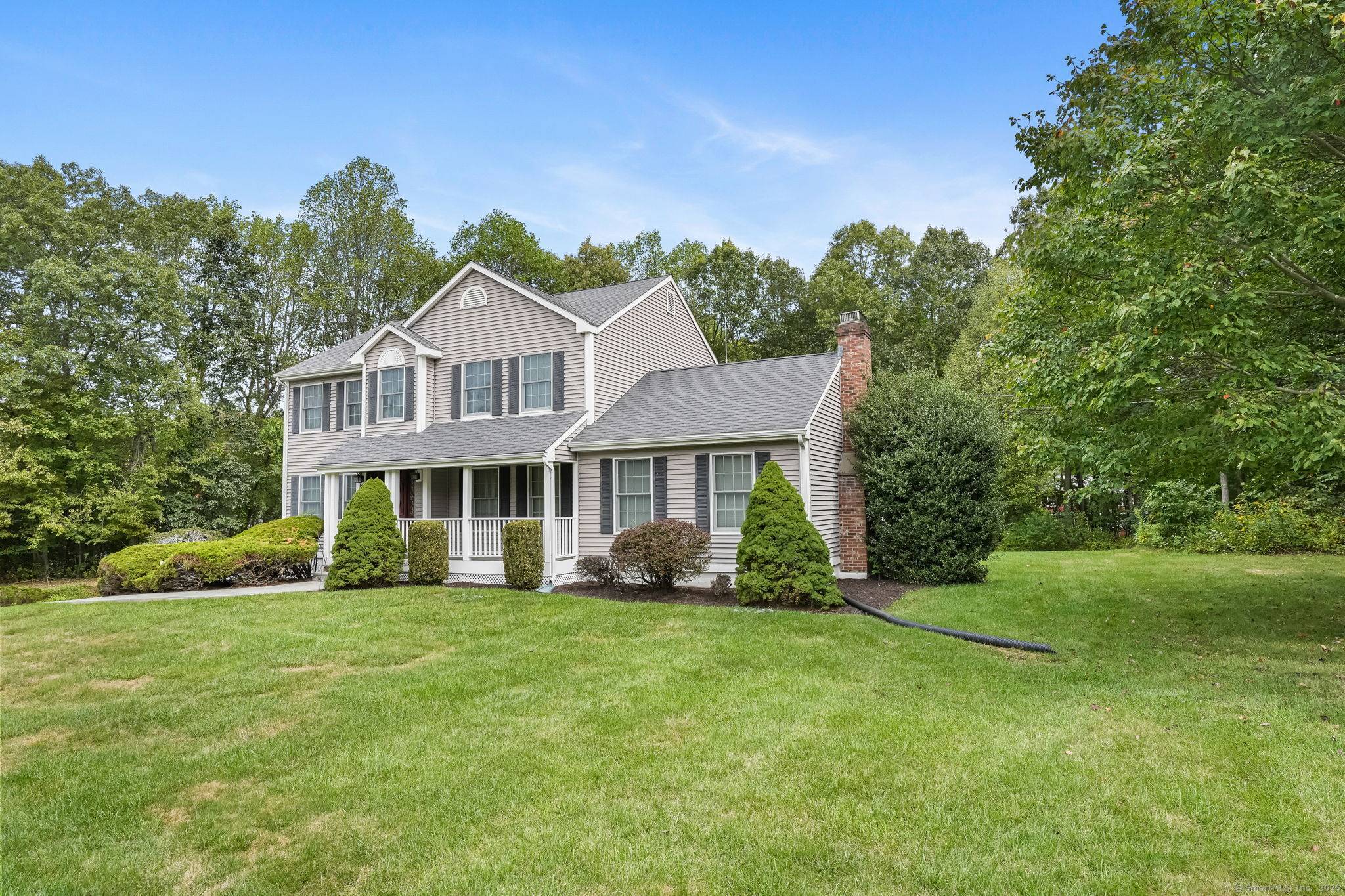 Set on a quiet cul de sac street in Seymour's desirable Great Hill neighborhood, this meticulously maintained custom built Colonial stands out with exceptional curb appeal and quality craftsmanship.