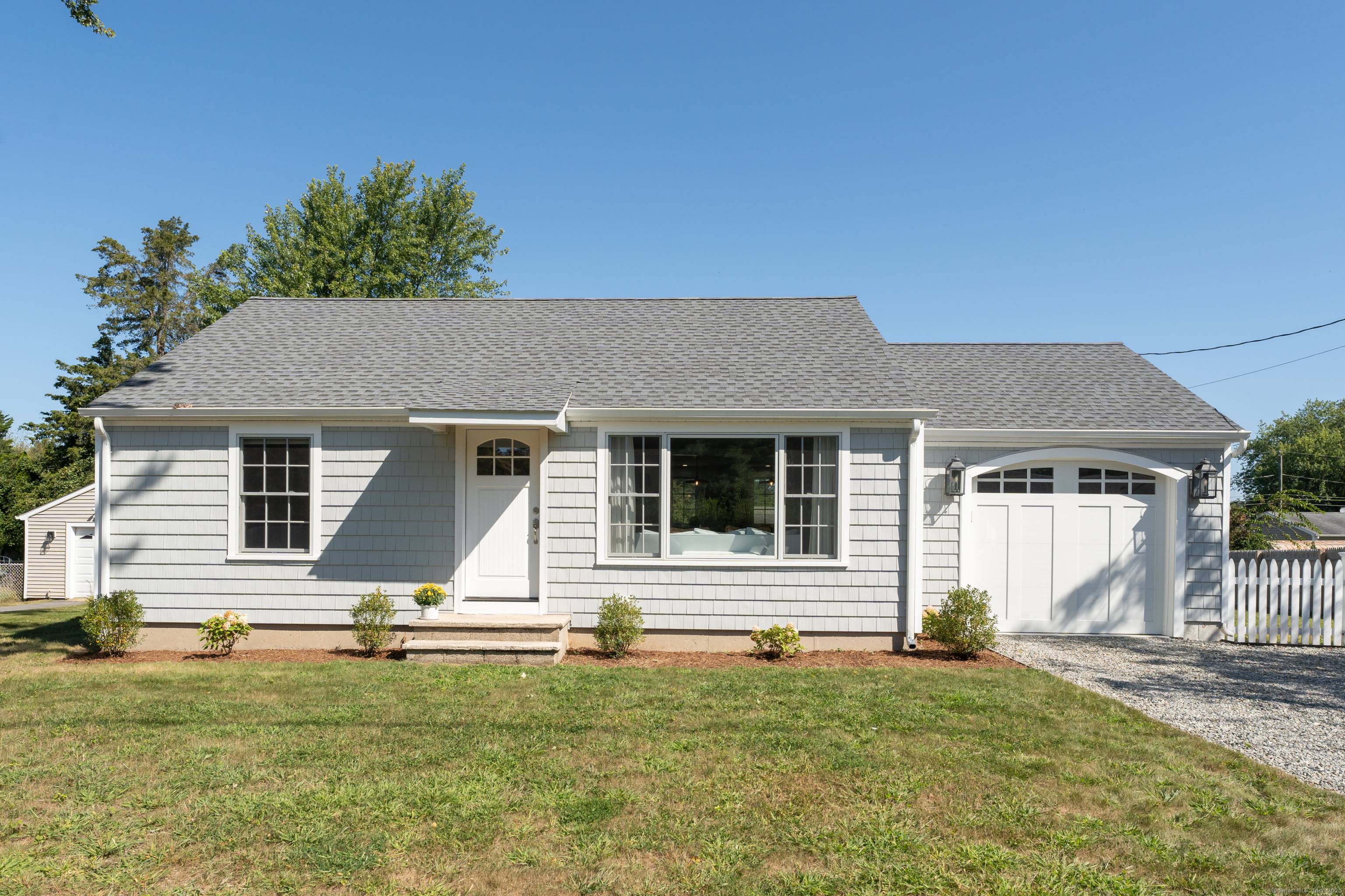 Indulge in the ease and sophistication of this home beautifully renovated down to the studs and added onto just two years ago, nestled in a prime location in Old Saybrook.