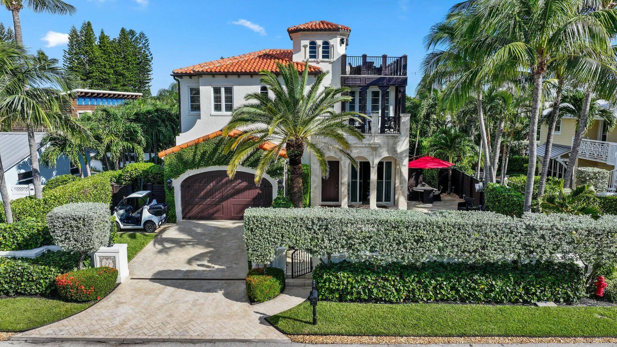 Welcome to this exquisite 3, 300 total sq ft seaside retreat nestled in the serene residential town of Ocean Ridge, where luxury meets coastal living.
