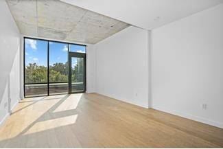 Park facing 2 bedroom residence with private terrace !