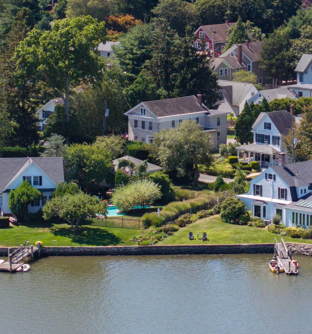 Welcome to 5 Park Place a truly rare opportunity to own a remarkable property on one of Mystic's most coveted waterfront streets.