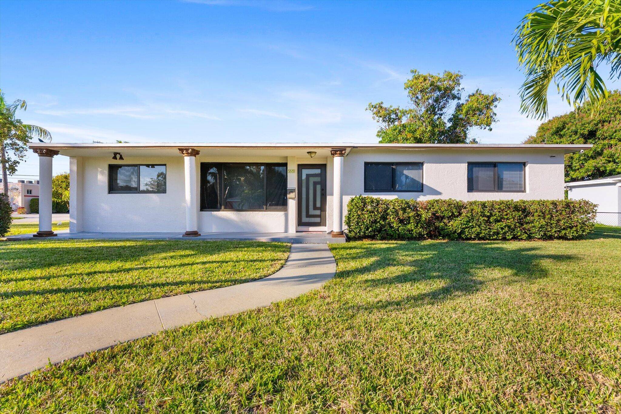 This Large 10, 000 sq ft Corner Lot Home is Clean, Bright, Spacious and Located steps away from Downtown Lake Park, where there's Family entertainment, Theatre, Eateries, Shopping and Waterside ...