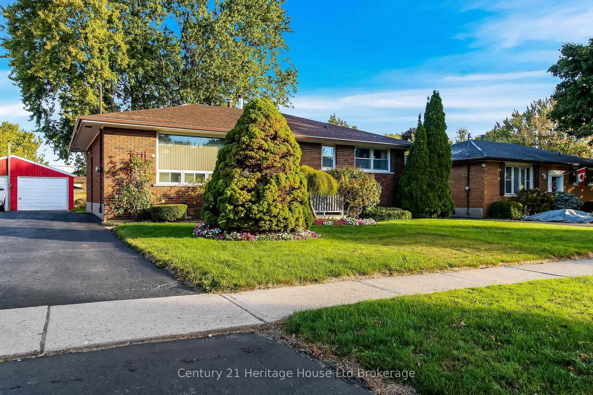 Welcome to 1009 Warwick Street, a charming all brick bungalow in a mature Woodstock neighbourhood close to schools, shopping, and churches.