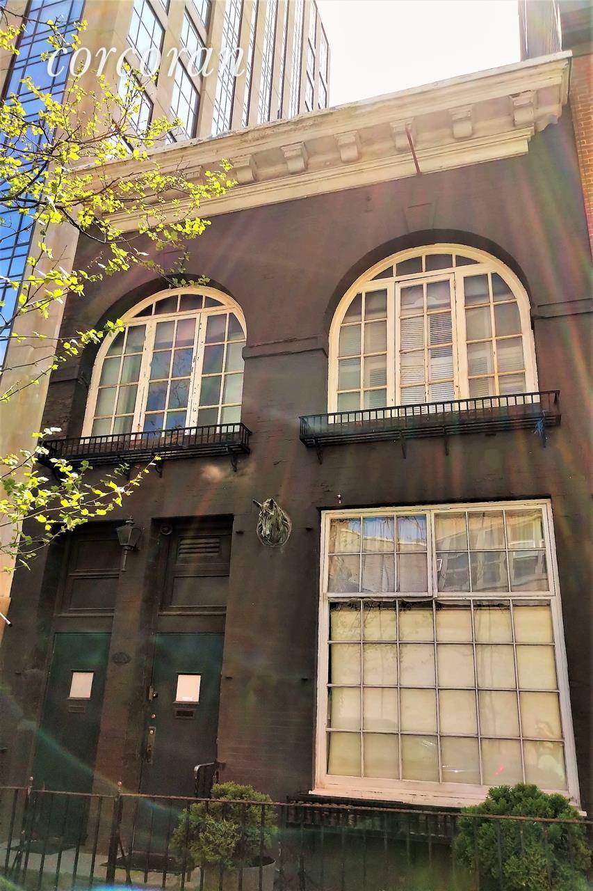 This brick carriage house is something special.