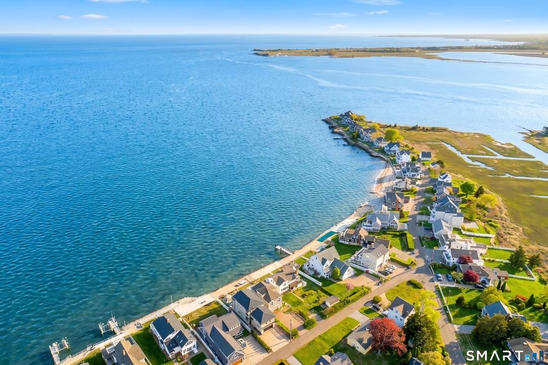 Welcome to exceptional direct waterfront living with breathtaking panoramic views of Long Island Sound and unforgettable sunsets from this stunning shoreline home.